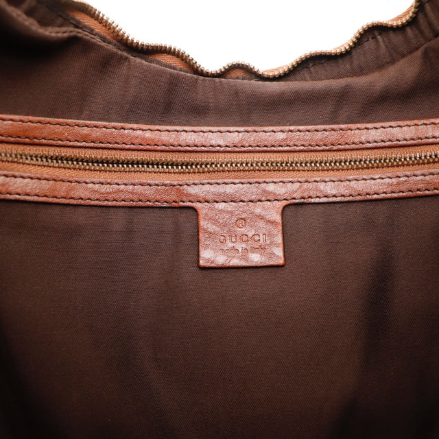 Vue du fond Gucci Hobo Jockey toile monogrammée beige et ébène occasion authentique — AMANA Vintage