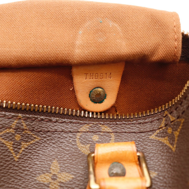 Détail des anses Louis Vuitton Speedy 25 cuir vachette occasion authentique — AMANA Vintage