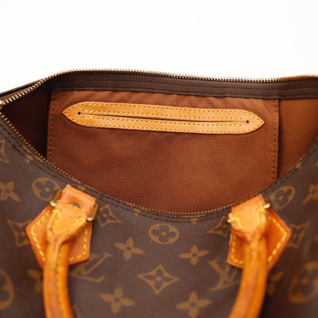Détail des anses Louis Vuitton Speedy 30 cuir vachette occasion authentique — AMANA Vintage