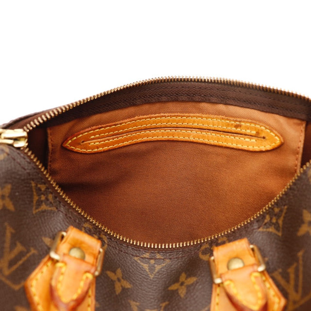 Vue des pattes d'attache Louis Vuitton Speedy 25 Toile Monogramme occasion authentique — AMANA Vintage