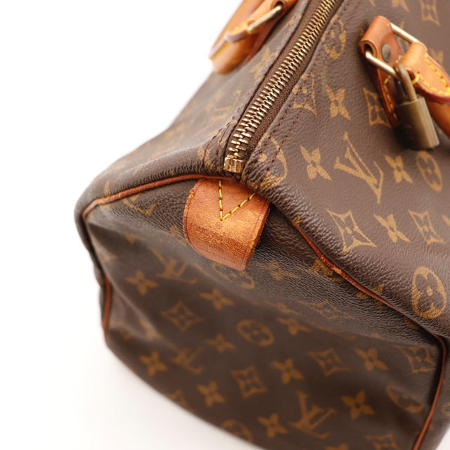 Détail du date code Louis Vuitton Speedy 35 Toile Monogramme occasion authentique — AMANA Vintage