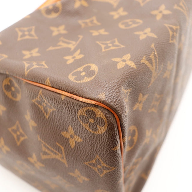 Détail du cadenas et des clés Louis Vuitton Speedy 35 Toile Monogramme occasion authentique — AMANA Vintage