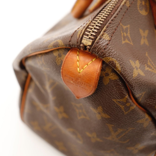 Détail de la fermeture éclair Louis Vuitton Speedy 30 Toile Monogramme occasion authentique — AMANA Vintage