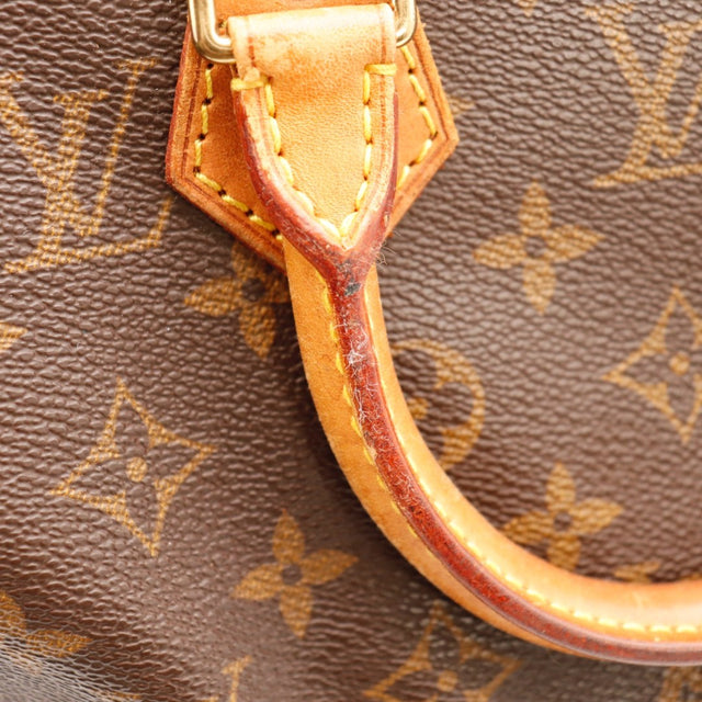 Détail du date code Louis Vuitton Speedy 25 Toile Monogramme occasion authentique — AMANA Vintage
