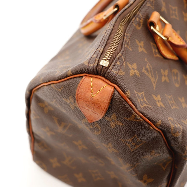 Détail de l'argenterie dorée Louis Vuitton Speedy 35 Toile Monogramme occasion authentique — AMANA Vintage