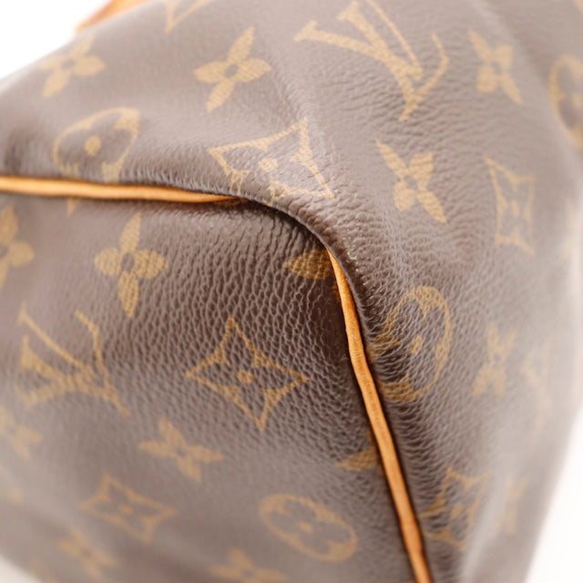 Détail du date code Louis Vuitton Speedy 25 Toile Monogramme occasion authentique — AMANA Vintage