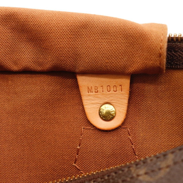 Détail des pattes d'attache Louis Vuitton Speedy 35 cuir vachette occasion authentique — AMANA Vintage