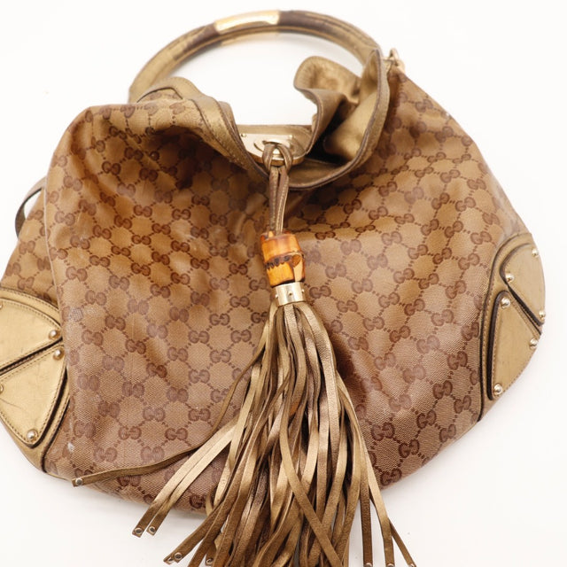Vue de l'intérieur Gucci Indy Hobo toile monogrammée bronze occasion authentique — AMANA Vintage