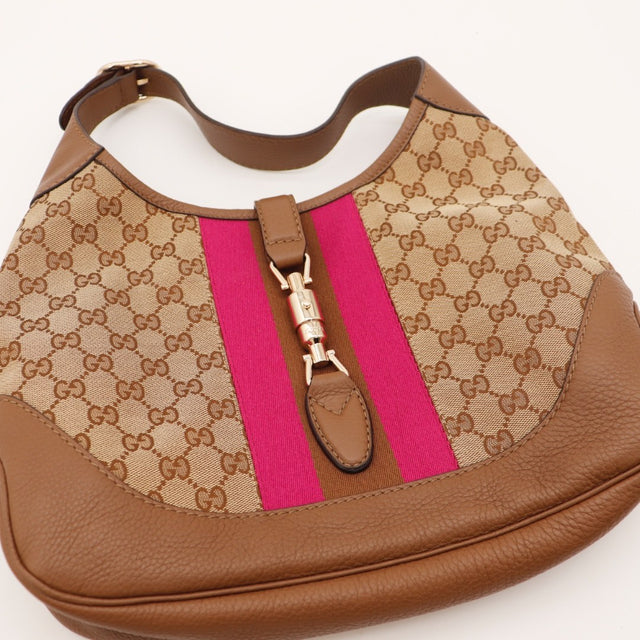 Détail anse en cuir grainé Gucci New Jackie occasion authentique — AMANA Vintage