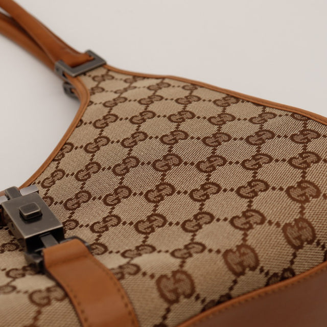 Détail toile monogrammée Gucci Jackie occasion authentique — AMANA Vintage