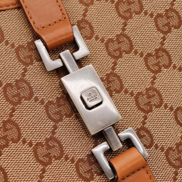 Détail piston fermoir Gucci Jackie occasion authentique — AMANA Vintage