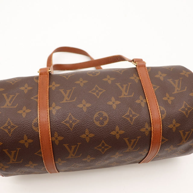 Détail anses cuir vachette patine caramel Louis Vuitton Papillon 30 — AMANA Vintage