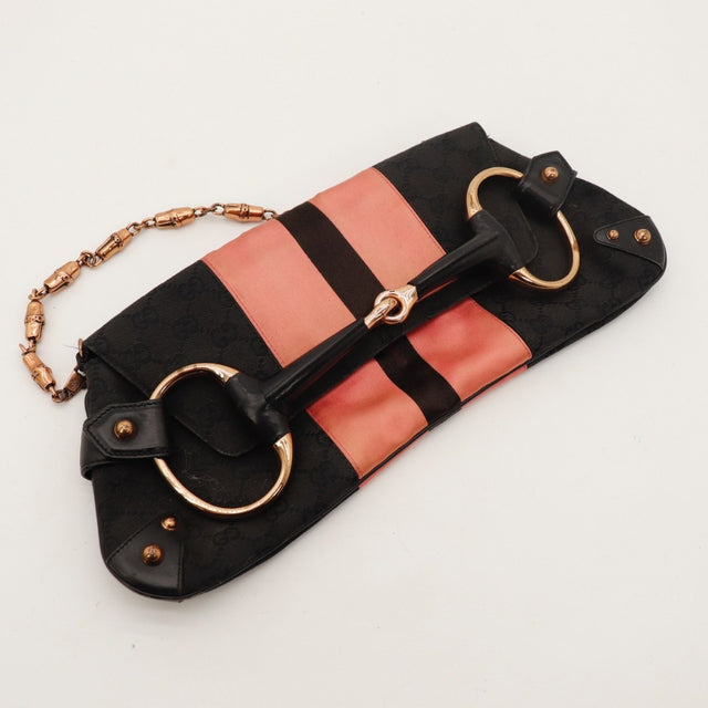 Détail de la chaîne façon bambou Gucci Pochette Horsebit toile monogrammée occasion authentique — AMANA Vintage