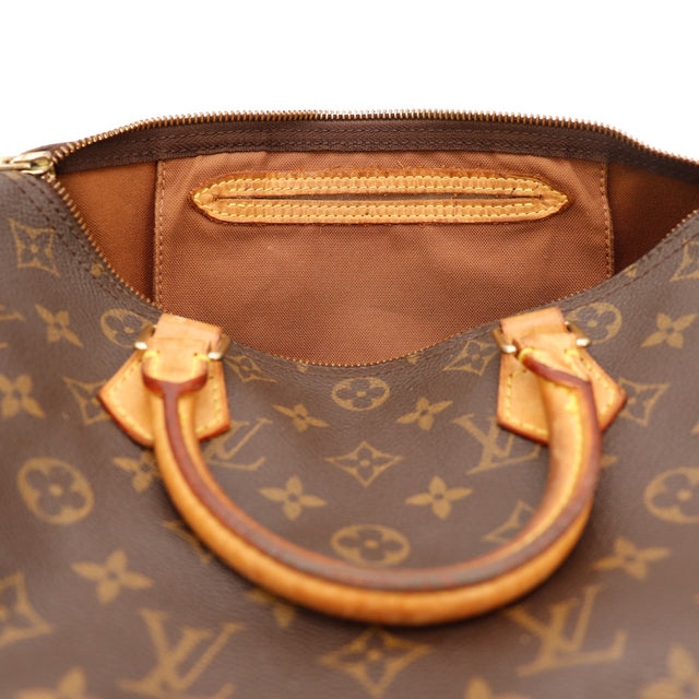 Binnenkant Louis Vuitton Speedy 30 voering textile bruin poche Binnenkante — AMANA Vintage