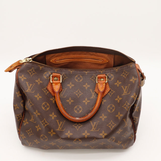 Détail de la fermeture Louis Vuitton Speedy 30 Toile Monogramme occasion authentique — AMANA Vintage