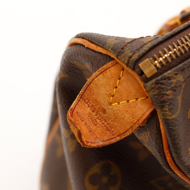 Detail tab vachette estampillé Louis Vuitton Paris Made in France Speedy 25 — AMANA Vintage