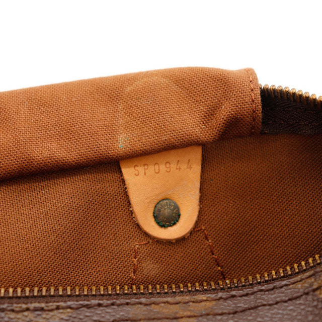 Binnenkant Louis Vuitton Speedy 30 gebruikssporen sur la voering bodem — AMANA Vintage