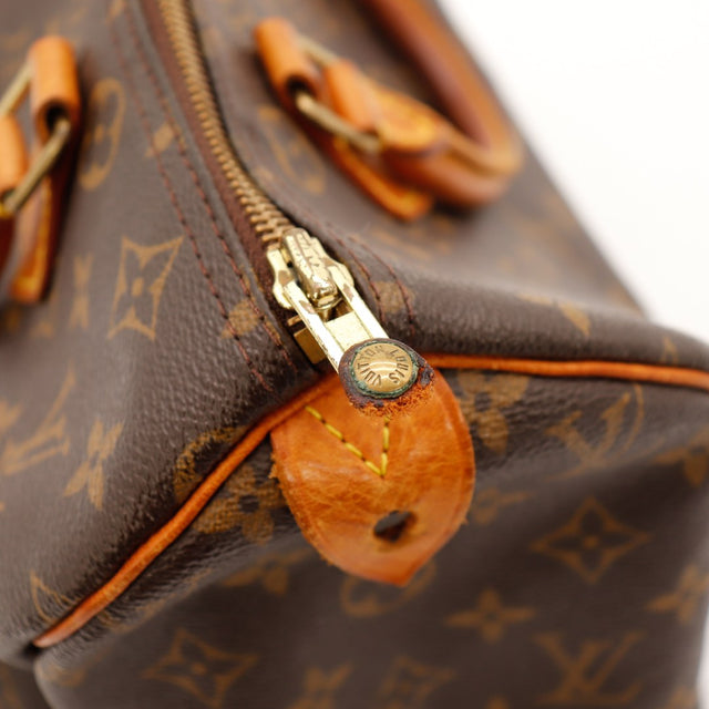 Detail ritstrekker en leer usée Louis Vuitton Speedy 30 — AMANA Vintage