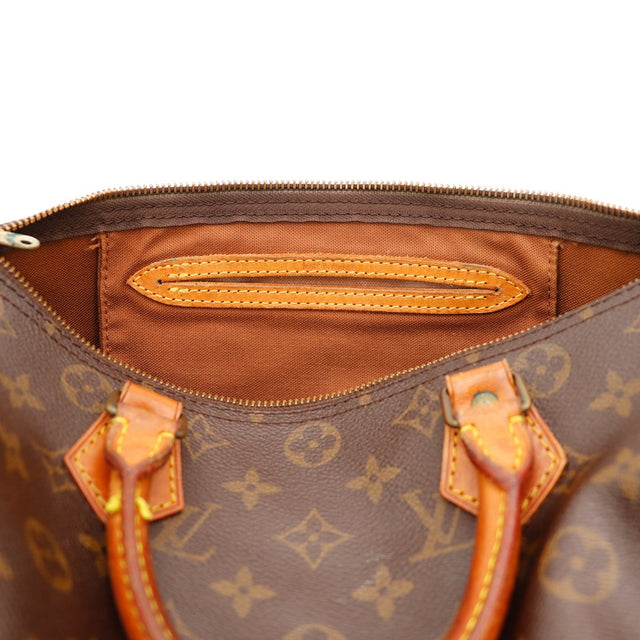 Binnenkant Louis Vuitton Speedy 30 voering textile en poche — AMANA Vintage