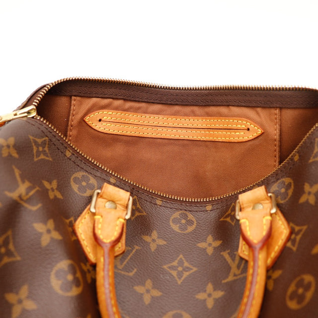 Binnenkant Louis Vuitton Speedy 30 voering textile bruin schoon — AMANA Vintage