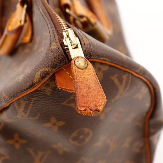 Detail ritstrekker gerafeld rits Louis Vuitton Speedy 30 tweedehands — AMANA Vintage