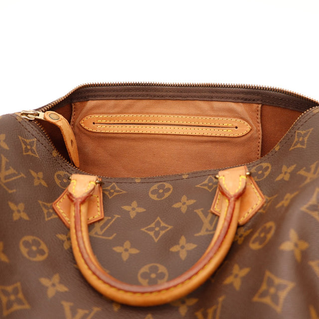 Binnenkant Louis Vuitton Speedy 30 voering bruin ritsvak — AMANA Vintage