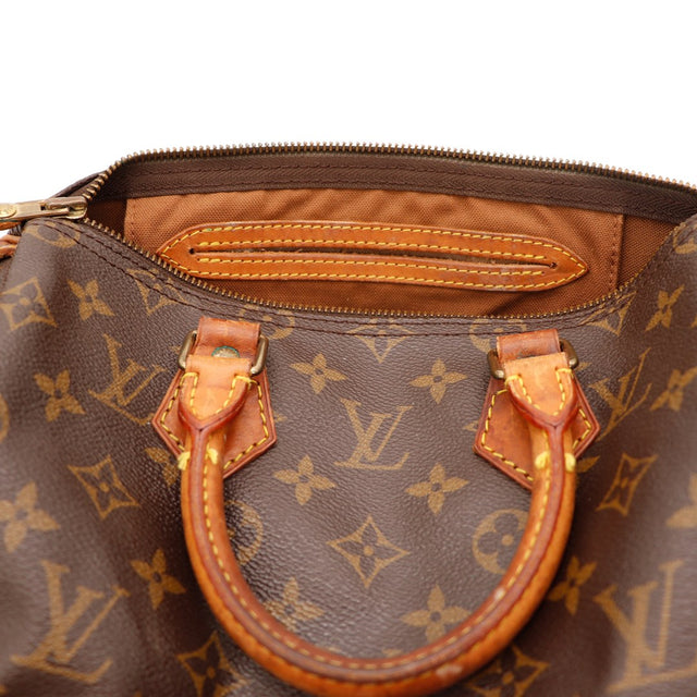 Binnenkant voering Louis Vuitton Speedy 25 ritsvak — AMANA Vintage