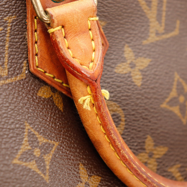 Detail bevestiging handvat Louis Vuitton Speedy 25 klinknagel vert-de-gris stiksels — AMANA Vintage