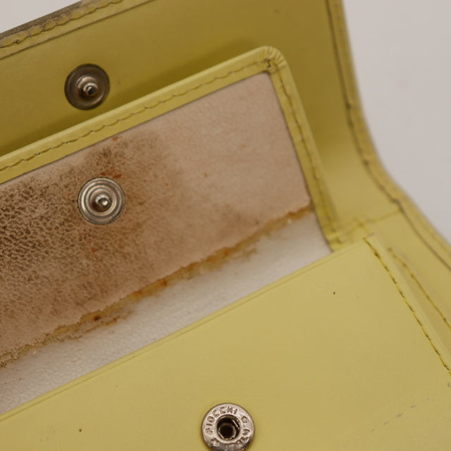 Pormenor do interior do bolso para moedas da carteira Courrèges manchas visíveis — AMANA Vintage