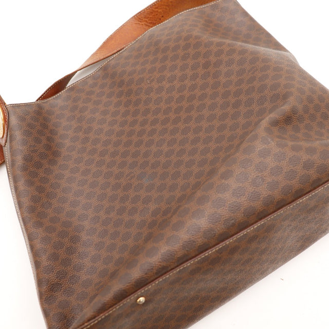 Détail toile Macadam Celine close-up motif C entrelacés marron — AMANA Vintage