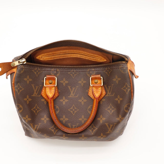 Détail des pattes d'attache Louis Vuitton Speedy 25 cuir vachette occasion authentique — AMANA Vintage
