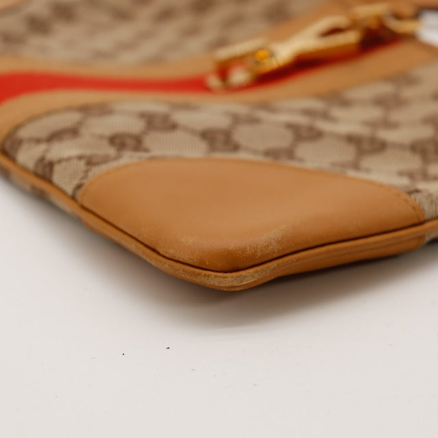 Détail canvas GG et languette cuir camel sac Gucci Jackie Web — AMANA Vintage