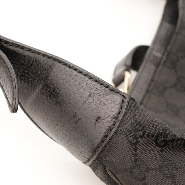 Vue d'ensemble Gucci Jackie toile GG noire occasion authentique — AMANA Vintage