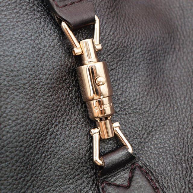 Vue de dos Gucci New Jackie cuir grainé noir occasion authentique — AMANA Vintage
