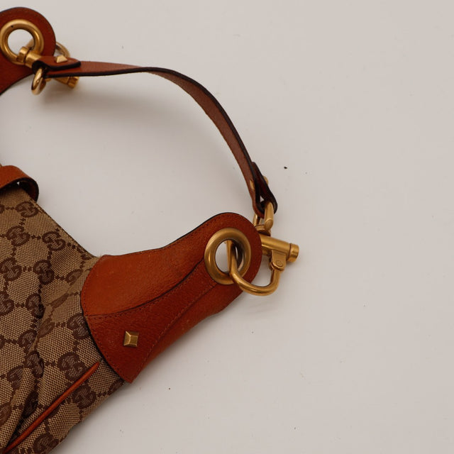 Détail anneau et fixation anse cuir grainé terracotta Gucci New Jackie — AMANA Vintage