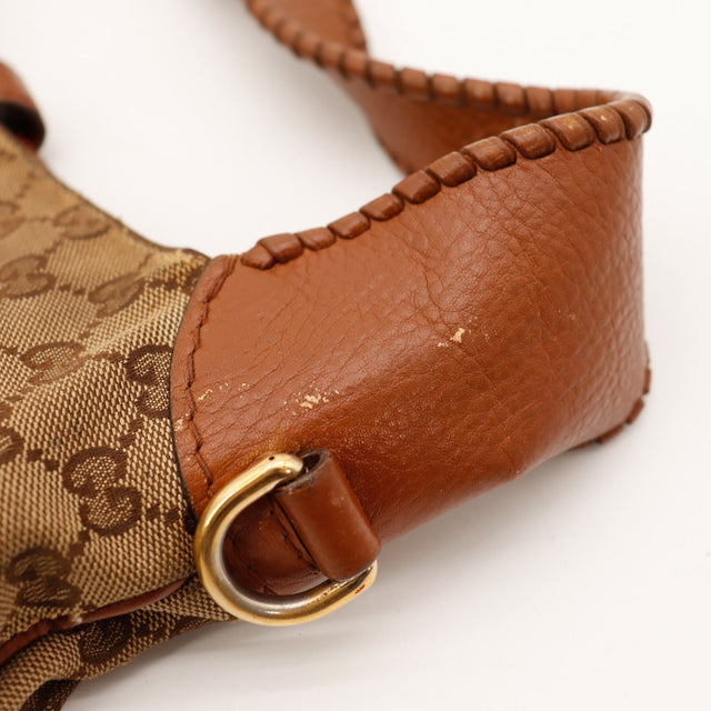 Détail anse et anneau Gucci New Jackie cuir cognac usure — AMANA Vintage
