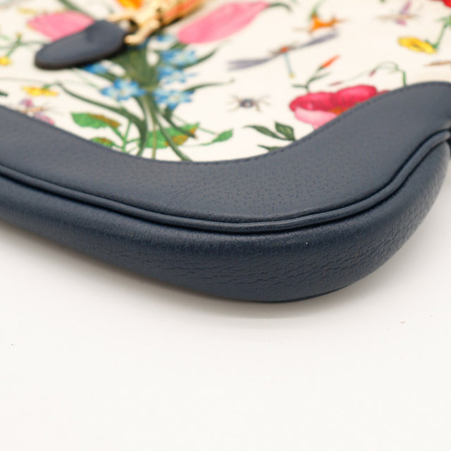 Détail coin inférieur droit Gucci Jackie Flora cuir grené bleu marine — AMANA Vintage