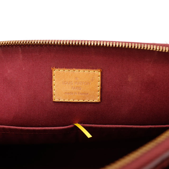Intérieur doublure bordeaux Louis Vuitton Alma PM Vernis étiquette Paris — AMANA Vintage