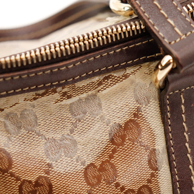 Détail délamination revêtement crystal Gucci Boston — AMANA Vintage