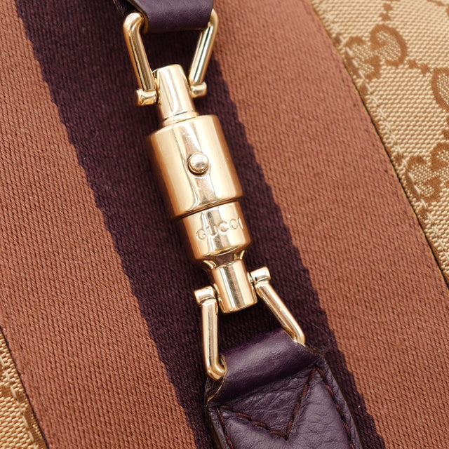 Intérieur doublure toile beige sac Gucci New Jackie zip cuir prune — AMANA Vintage
