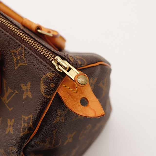 Détail de l'argenterie Louis Vuitton Speedy 25 Toile Monogramme occasion authentique — AMANA Vintage