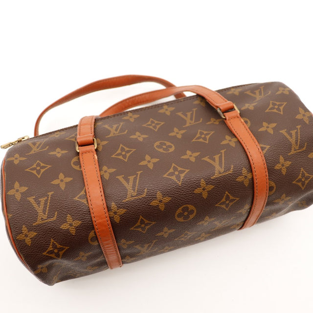 Détail attache anse Louis Vuitton Papillon 30 vert-de-gris visible — AMANA Vintage