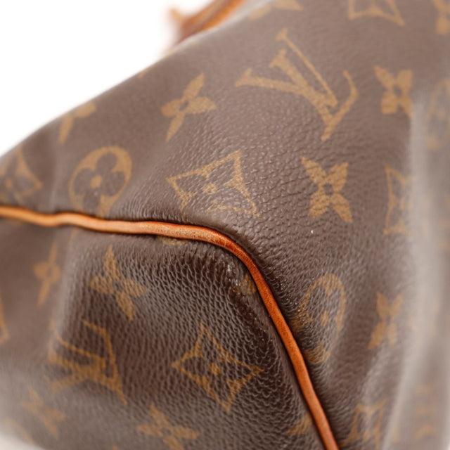 Détail de la fermeture Louis Vuitton Speedy 25 Toile Monogramme occasion authentique — AMANA Vintage