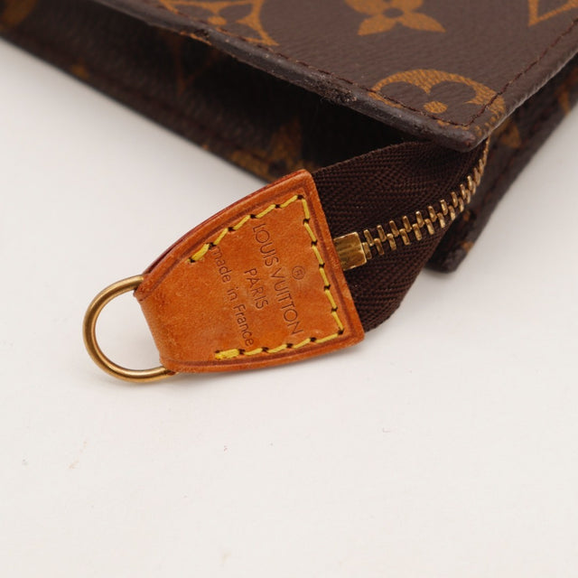 Vista de perfil da bolsa de higiene Louis Vuitton Monogram vintage — AMANA Vintage
