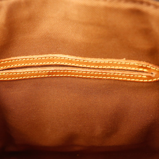 Detail coins inferieurs Louis Vuitton Alma PM cuir vachette taches occasion — AMANA Vintage