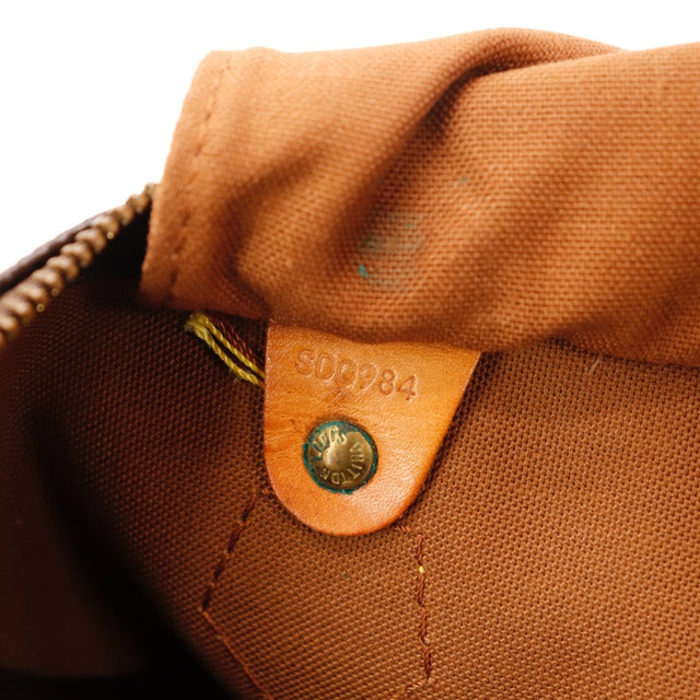 detail van vachettaleer gepatineerd van Louis Vuitton Speedy 35 — AMANA Vintage