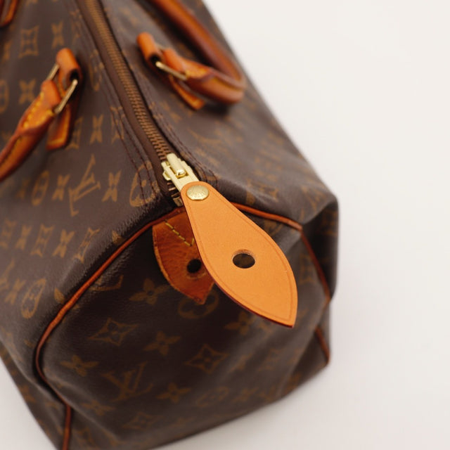 details van handvatten van vachettaleer van Louis Vuitton Speedy 35 — AMANA Vintage