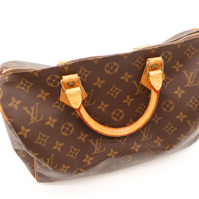 detail handvatten in bevestigingen vachettaleer Louis Vuitton Speedy 30 — AMANA Vintage
