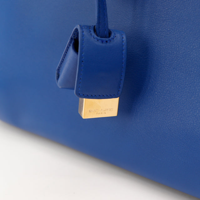 Détail anses cuir bleu Sac de Jour Saint Laurent occasion — AMANA Vintage
