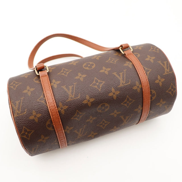 Détail des anses Louis Vuitton Papillon 26 cuir marron occasion authentique — AMANA Vintage